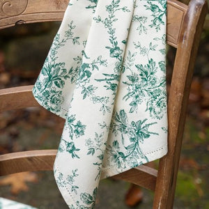 Add vintage cottage charm to your table with our Green Floral Toile Napkin Set. The set of four dinner napkins features a detailed green floral design against a vintage ivory background and elegant hemstitched edges. Set of four. 100% cotton. 20" x 20" 