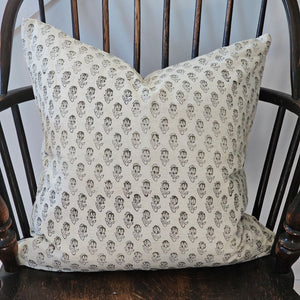 Add sweet, vintage cottage charm to any room with this Block Print Pillow with Grey-Sage Floral.&nbsp; Features a hand-printed tulip style pattern, using wood blocks carved with the design. The beautiful greyish-green colored design pattern pops against the cream background. Crafted from a blend of cotton and linen. Includes a zippered closure on the backside. Polyester insert included. 19.5" x 19.5"