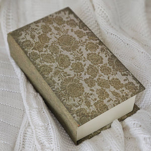 Inspired by antique bookshop finds, our Hardcover Book Journal, Old-World Floral is like snuggling up with an old book, only this time, you get to be the author. Features a faded and aged floral print hardcover. It's infused with vintage charm. The pages of this journal have lines for neat note keeping. The binding also has an old book feel.