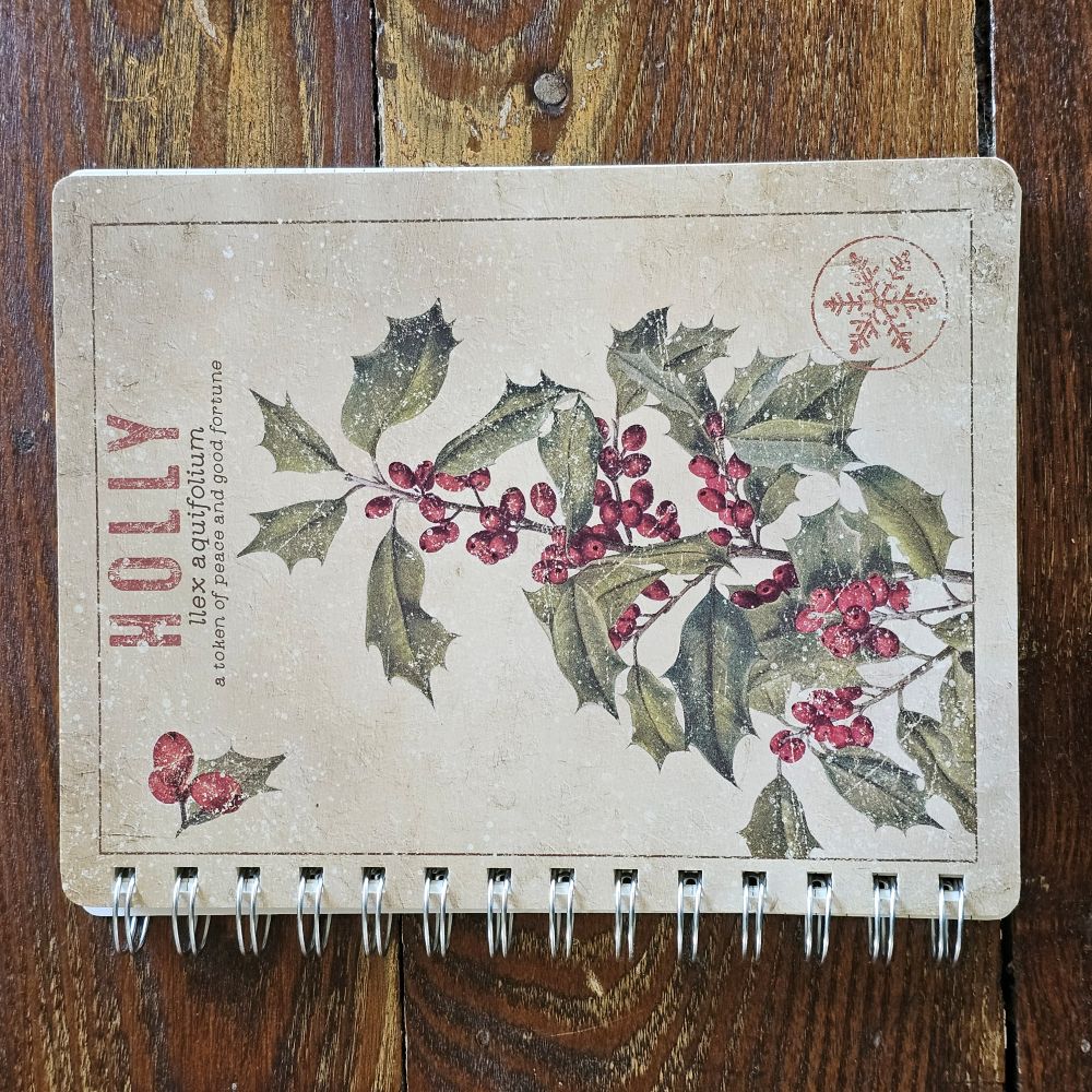 Capture the essence of winter botanicals with our Holly Notebook from our Christmas collection. This double-sided design features vintage plant study artwork rendered in distressed details that evoke timeless charm and aged character. With 120 lined pages, it's an ideal companion for journaling, note-taking, or sketching throughout the season. A thoughtfully curated gift for those who appreciate seasonal aesthetics and botanical inspiration.