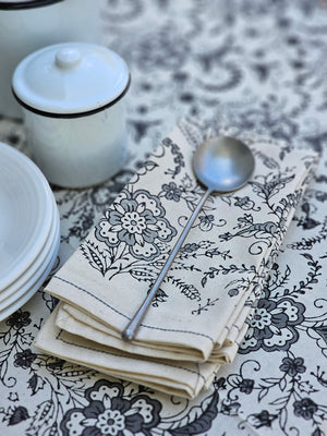 Create your signature look with our Ivy Slate Block Print Tablecloth and Napkin Collection. This collection features hand-printed cotton, using wood blocks carved with intricate designs. The beautiful slate colored ivy design pattern pops against the cream background. Crafted from 100% cotton, the tablecloth is available in two sizes and the napkins come as a set of four. 