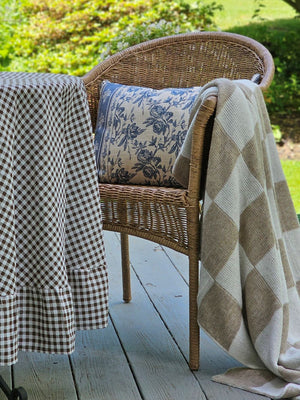 Knit Beige and Cream Check Throw with French Blue Floral Pillow ad Brown Gingham Tablecloth 
