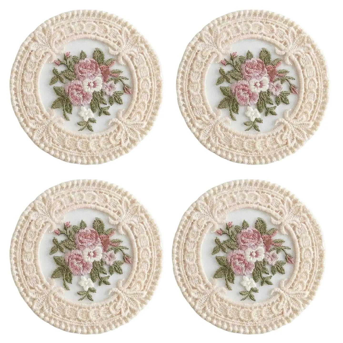 The Lace Embroidered Floral Coaster Set adds timeless elegance to coffee tables, vanities, and dining spaces. Designed with intricate lace detailing and a delicate floral embroidered center, this decorative coaster brings vintage-inspired charm to your home. The fabric construction helps absorb light condensation while providing a soft barrier between cups and surfaces. Ideal for everyday use or display, it combines romantic detailing with practical table protection. Set of four. 4.75" Diam