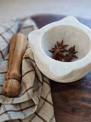 With a vintage apothecary feel, our Marble Mortar with Wood Pestle is a great tool for the kitchen or bath. This workhorse is ready to help release all the flavors and scents of herbs and spices. Bowl is 6”Diam x 3”H, Wood Pestle is 5.75”L