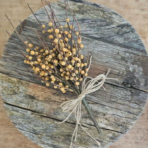 Add a rustic touch to any bowl, basket or pot with our Mustard Berry Branch Bush. The country mustard colored berries lend an earthy charm to any room in your farmhouse. This faux berry bush can easily tuck in to any bowl or basket to create a farm table centerpiece that will look beautiful in any season. Vases and ribbon not included. 13” H