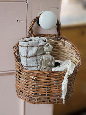 Bring a timeless French country charm to your home with our Natural Willow Wall Basket. Show with our Exvoto