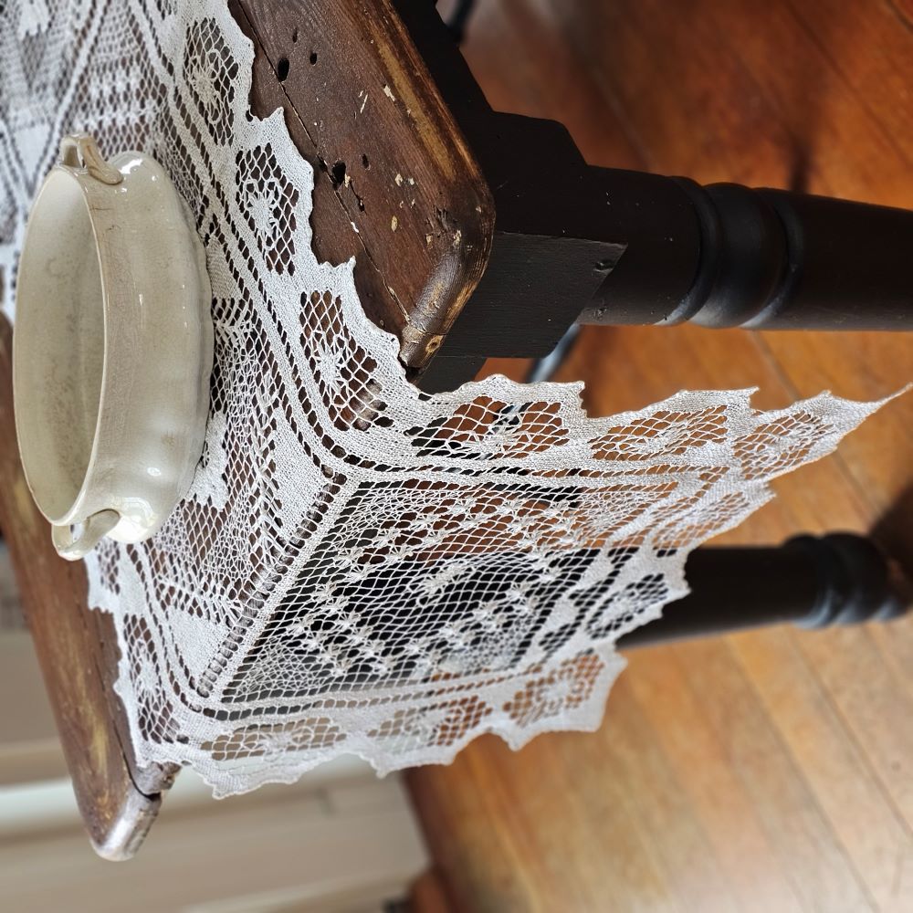 Our Old Tuscany Lace Table Runner adds old-world charm to any room. This sheer lace white runner has a dreamy vintage quality that is perfect for creating an country farmhouse look or for those who love cottage style. Features translucent white lace embroidered with a floral design and scalloped edging. 100% mercerized Cotton thread. 16”W x 45”L

Create easy no-sew cafe lace curtains with our curtain ring clips. Simply add two runners with one set of clips to create an old-world look.