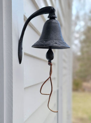 Our Old Farmhouse Dinner Bell reminds us of simpler times. An easy way to call the family in from playing or from farm chores, this heavy cast iron bell will add a vintage touch to your porch or entryway