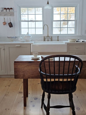 White Porcelain Tea Cup and Saucer with Gold Lace Design