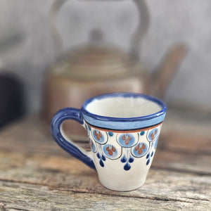 Every sip from our Porto Hand-Painted Espresso Cup is a reminder to slow down and appreciate the simple things in life. This ceramic mug will make you dream of far-away places with its vibrant blue and brown teardrop design.&nbsp;

Made from the finest volcanic clay, the cup combines traditional pottery techniques with modern high-firing processes, ensuring a lead-free, durable, and microwave-safe finish. Its compact size and sturdy design make it a delightful addition to your kitchen or coffee bar.