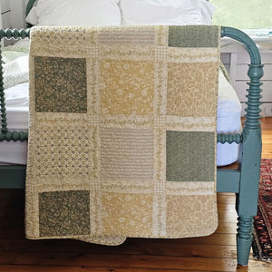 Prairie Meadow Patchwork Quilt Throw Blanket is made of 100% cotton. Featuring a classic patchwork design in soothing shades of sage green, beige, white, buttercream gold, and cream, this throw adds a serene, cottage-inspired touch to any space. Crafted with a 100% soft cotton cover, it’s lightweight yet warm—perfect for year-round use. The elegant patchwork quilted throw reverses to a printed pattern for two looks in one!