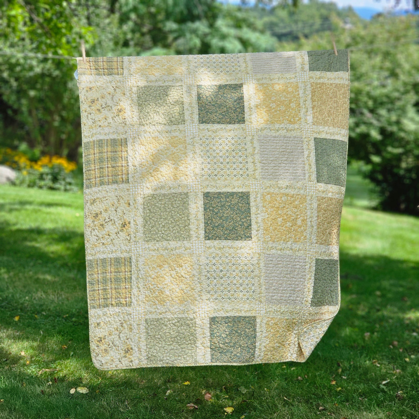 Add a cozy, vintage farmhouse feel to a guest room or reading nook with this quilted throw. Our Prairie Meadow Patchwork Quilt Throw Blanket is made of 100% cotton. Featuring a classic patchwork design in soothing shades of sage green, beige, white, buttercream gold, and cream, this throw adds a serene, cottage-inspired touch to any space. Crafted with a 100% soft cotton cover, it’s lightweight yet warm—perfect for year-round use.