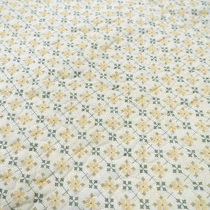 Add a cozy, vintage farmhouse feel to a guest room or reading nook with this quilted throw. Our Prairie Meadow Patchwork Quilt Throw Blanket is made of 100% cotton. Featuring a classic patchwork design in soothing shades of sage green, beige, white, buttercream gold, and cream, this throw adds a serene, cottage-inspired touch to any space. Crafted with a 100% soft cotton cover, it’s lightweight yet warm—perfect for year-round use.