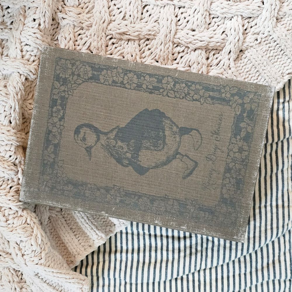 Inspired by antique bookshop finds, our Vintage Hardcover Journal, Rainy Days is like snuggling up with an old book, only this time, you get to be the author. Features a faded hardcover and discolored paper pages. It's infused with vintage charm. Like old books, the pages of this journal have an aged warmth and have lines for neat note keeping. 