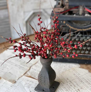 Add a rustic touch to any bowl, basket or pot with our Red Berry Branch Bush. The country red colored berries and brown branches lend an earthy charm to any room in your farmhouse. This faux berry bush can easily tuck in to any bowl or basket to create a farm table centerpiece that will look beautiful in any season. Vases and ribbon not included. 13” H