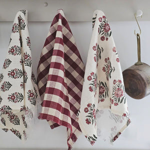 This beautiful set of three Green and Red Gingham and Block Print Tea Towels will give your kitchen a touch of English cottage charm. The mix of colors and patterns offers a relaxed country style with ruffled edges for added texture. Perfect for creating a cozy cottage feel in your home. 100% cotton. Machine wash. Set of Three. 17"W x 27"H