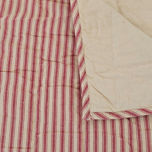 Whether you're creating a farmhouse style bedroom, a cozy cabin nook or a cottage guest room, our Red Ticking Stripe Quilt offers vintage charm. This hand-quilted, 100% cotton coverlet gets softer with each washing. Features popular ticking stripes in red along with a buttery oat stripe on one side and a solid buttery oat on the reverse side.