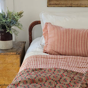 Whether you're creating a farmhouse style bedroom, a cozy cabin nook or a cottage guest room, our Red Ticking Stripe Quilt offers vintage charm. This hand-quilted, 100% cotton coverlet gets softer with each washing. Features popular ticking stripes in red along with a buttery oat stripe on one side and a solid buttery oat on the reverse side.