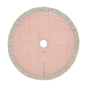 The Red Ticking Stripe Christmas Tree Skirt lends old-timey vintage charm to your holiday home. This 48" regular tree collar has a 100% cotton shell featuring a textured chambray striped pattern and ruffled border for that old-fashioned feel. The reverse side is a rustic farmhouse oatmeal, which gives it a flax linen feel. Wood buttons finish off this beautiful tree skirt.