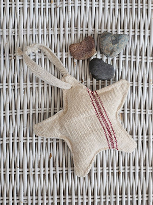 Our Red Stripe Grain Sack Star Ornament looks so charming whether you're Christmas style is French Country, Vintage Farmhouse, or classic Nordic style. This fabric star ornament offers an old-fashioned look, inspired by French grain sacks. 100% Cotton. 5.25" Diam