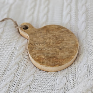 The Round Chunky Wood Cutting Board Coaster adds a decorative touch to any table . The rustic style board is perfect as a countertop display or hanging from hooks. For decorative use only. 7.5"L x 5.5"W x 1"H
