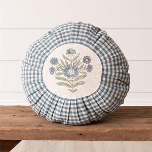 This Round Pleated Cottage Blue Gingham Pillow will bring a touch of English cottage style to any room. Featuring a classic country gingham pattern with sweet pleats and a block print style flower in the center, it adds instant charm and sophistication. Spot clean only. 100% cotton with Polyester insert. 16" Diam