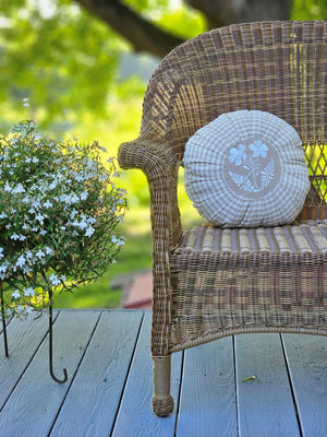 This Round Pleated Cottage Tan Gingham Pillow will bring a touch of English cottage style to any room. Featuring a classic country gingham pattern with sweet pleats and an embroidered white flower in the center, it adds instant charm and sophistication. Spot clean only. 100% cotton with Polyester insert. 16" Diam