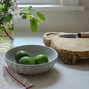 The Rustic Ceramic Pasta Bowls, Set of Two, is the perfect size for serving up pasta dishes and more. This wide bowl has a low profile and features a cool gray-white speckled glaze and ribbed design. It brings an earthy elegance to your farmhouse kitchen. Set of Two.