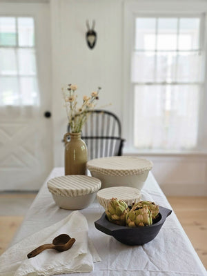 Expertly crafted from mango wood and finished with a dark rustic look, our Rustic Peasant Bowl adds a touch of primitive charm to any setting. With its mini dough bowl design, it's perfect for displaying small treasures on any table or shelf. 