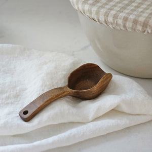 Perfect for scooping sugar, flour, rice, beans, oats, and more, this unique wood scoop is perfect for an organized kitchen! The Rustic Wood Scoop is handmade of laurelwood and finished with food-safe raw tung oil, each scoop is durable and protected against the elements. Hand-carved and Fair Trade!