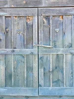 This Rustic Weathered Metal Heart Ornament adds instant farmhouse style charm. Features a gray-washed puffed metal heart ornament with a weathered, distressed finish. Item includes a jute cord hanger.