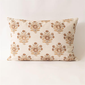 Add sweet, vintage cottage charm to any room with this Rustic Orange Block Print Pillow. Features faded browns and orange hues against a cream background. Crafted from 100% cotton. Includes a zippered closure for easy removal. Polyester insert included.