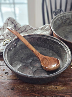 Crafted from natural wood, this ladle seamlessly blends functionality with understated elegance. Perfect for ladling soups, stews, and other dishes, it offers a lightweight yet durable construction that complements any culinary space. An environmentally conscious choice that marries rustic charm with enduring practicality. 12.4"H