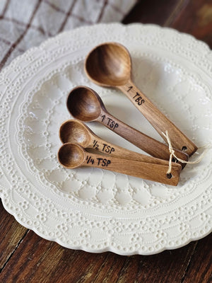 Bring rustic farmhouse style to your cooking with this Wood Measuring Spoon Set. These handmade wooden measuring spoons are so nice you won't want to use them and get them dirty! This set will complement any kitchen. Made of laurelwood, each is unique, no two are exactly alike! Handmade and fair trade