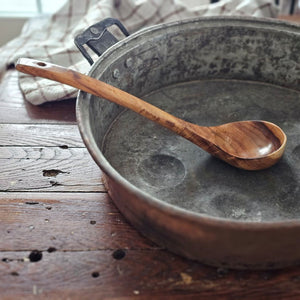 Crafted from natural wood, this ladle seamlessly blends functionality with understated elegance. Perfect for ladling soups, stews, and other dishes, it offers a lightweight yet durable construction that complements any culinary space. An environmentally conscious choice that marries rustic charm with enduring practicality. 12.4"H
