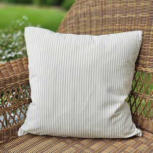 The Sage Grey Thin Stripe Pillow offers simple, minimal style. This soft white accent pillow with light sage-grey pin stripes is crafted of 100% cotton with a zipper closure. The cotton has a rustic stonewashed look. This throw pillow is ideal for layering and lounging. Machine washable. 100% cotton. Polyester insert included. 18" x 18"