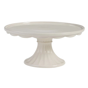 The Scalloped Edge Creamware Cake Stand is perfect for displaying your creative creations. Great for cheese, cookies, cakes and more, this vintage style bakery shop pedestal makes an ideal addition to any creamware collection. The sweet ruffled edge design gives this cake stand added charm. Antique White. 10.75" Diam x 4.75"H