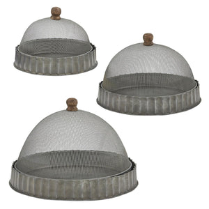 Keep bugs at bay on warm summer days with our Screen Food Covers with Metal Base, Set of Three . A wire mesh cloche, also known as a shoo-fly, is perfect for protecting food from flies and other insects.  Our set of three Wire Mesh Food Covers has tons of vintage charm and offers a range of sizes. They feature aged metal base with scalloped edges. Add rustic elegance to your farmhouse kitchen or patio with our vintage style Screen Food Covers, Set of Three. 8.75" DIA X 5.5"H 10.75" DIA X 8"H 12" DIA X 9"H