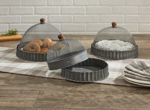 Keep bugs at bay on warm summer days with our Screen Food Covers with Metal Base, Set of Three . A wire mesh cloche, also known as a shoo-fly, is perfect for protecting food from flies and other insects.  Our set of three Wire Mesh Food Covers has tons of vintage charm and offers a range of sizes. They feature aged metal base with scalloped edges. Add rustic elegance to your farmhouse kitchen or patio with our vintage style Screen Food Covers, Set of Three. 8.75" DIA X 5.5"H 10.75" DIA X 8"H 12" DIA X 9"H
