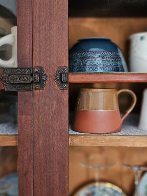The Sedona Rustic Glazed Mug combines artisanal craftsmanship with natural beauty, showcasing a harmonious blend of terracotta clay and a uniquely imperfect glaze. Its earthy exterior and subtle moody blue interior evoke a refined yet grounded ambiance, making every coffee moment feel thoughtfully curated and effortlessly cozy.