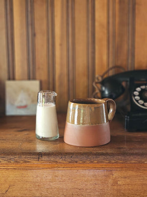 The Sedona Rustic Glazed Mug combines artisanal craftsmanship with natural beauty, showcasing a harmonious blend of terracotta clay and a uniquely imperfect glaze. Its earthy exterior and subtle moody blue interior evoke a refined yet grounded ambiance, making every coffee moment feel thoughtfully curated and effortlessly cozy.