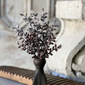Evoke the serene beauty of a frost-kissed winter landscape with this artfully crafted faux botanical. Featuring delicate seed pods in rich, earthy tones adorned with a pristine coating of crystalline snow, this decorative Snowy Seed Pods Bush captures the quiet elegance of a dormant garden.