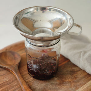The Stainless Steel Mason Jar Funnel is designed to work with both Regular and Wide Mouth Mason jars, as well as other containers. The opening is slightly smaller than a Regular Mouth opening; it fits all Mason jars perfectly. This stainless steel is ideal for canning small batches of baby food, sauces, jams and purees. In addition to canning, it can be used to neatly portion batter into muffin tins or cake pans, or pair it with a strainer or cheesecloth for filtering homemade broths and juices 