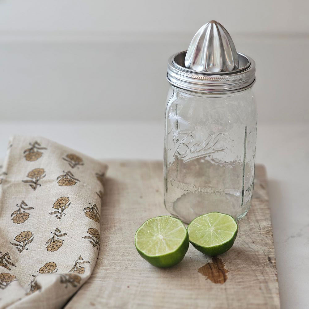 Keep it fresh with our Stainless Steel Juicer Lid for Wide Mouth Jars. Turn your favorite canning jar into an instant juicer with this stainless steel lid. It fits most wide mouth jars (jar not included). No electricity required--just a little elbow grease gets the job done, making this perfect for campers, too. Dishwasher safe. Stain-Resistant (Jar not included.) 3.39” diam