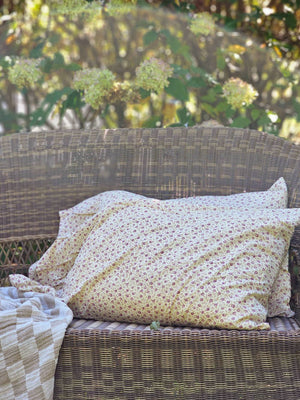 Add beautiful texture and vintage style to your bedroom with the Sweet Prairie Pillowcase Set. This cotton pillow slip set includes a delightful vintage floral pattern in soft creamy yellow with small mauve flowers and moss green details. The set features double-sewn seams for extra durability as well as extra length to ensure good coverage of your fill pillow (not included). An generous 8-inch ruffle lends country cottage elegance. The 100% cotton weave features a crisp, vintage feel.