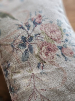 The Velvet Pouch with Vintage Floral Design is an elegant clutch perfect for makeup and other essentials. It showcases a romantic velvet floral pattern on one side, complemented by a smooth light beige-pink satin backside. Measuring 9" wide by 6" high, this zippered pouch combines style with practicality. Print will vary on each bag.