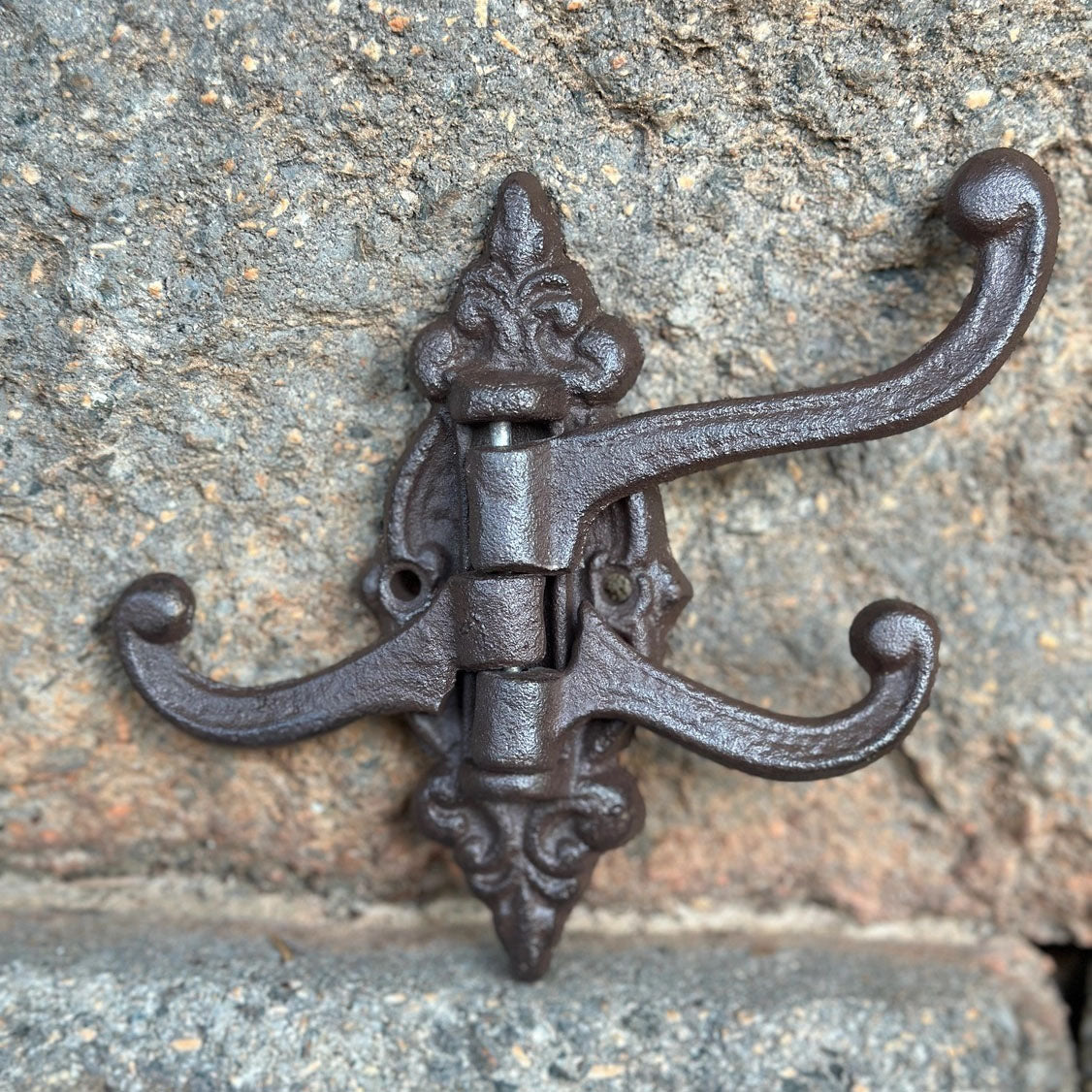 Our Victorian Style Swivel Wall Hook brings antique style to any room. Perfect for hanging dishtowels, scarves, necklaces and more, this vintage reproduction features three hooks that swivel. Add historic charm to your farmhouse entryway, kitchen or bath with this cast iron wall-mounted hook. Hardware not included. 