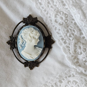 Classic old-world style is infused in these Vintage Style Cameo Brooch Pendants. Each is set in an antique-inspired frame. This classic French blue cameo also doubles as a brooch. The convenient bale soldered on the back makes it easy to convert from a brooch to a pendant. Whether at the office, or with a black tee and jeans this brooch/pendant can be worn on a chain, or simply left on the favorite blazer of choice. 
