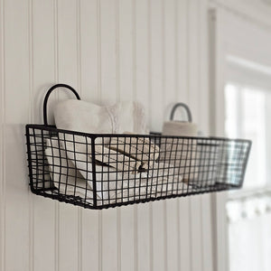 This Vintage Style Wire Wall Basket offers a stylish storage solution for any room. Stash away potting shed materials, toiletries, or keep spices close at hand in the kitchen. Features a black finish. Can be used as a wall bin or as a tabletop basket. 