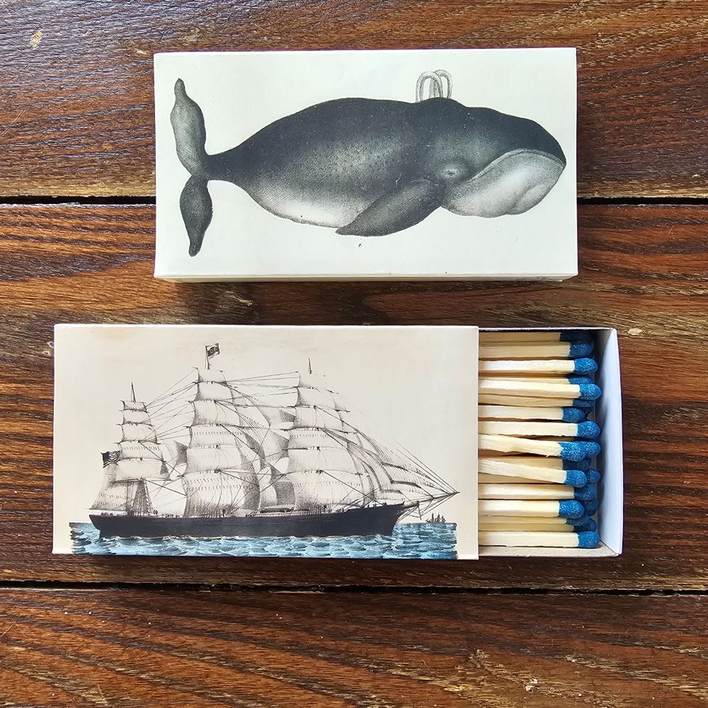 These stylish wood matches, with a Vintage Ship and Whale design, are the perfect complement to any space. Modern, chic, with a vintage graphic design, they are perfect for any room. The match striker is side of the box for easy lighting. Safety matches, 50 sticks per cardboard box. Includes set of two boxes. Each is 4.25" x 2.25" x .75"